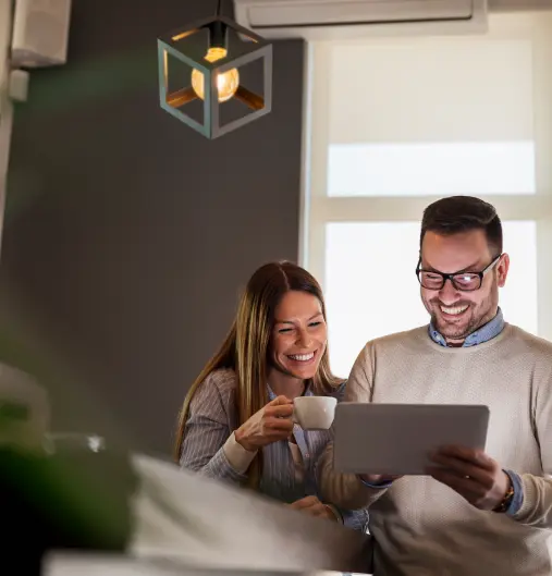 Couple using tablet computer | Nellie Health Online Therapy Ontario Canada US
